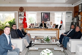 disk-antalya-subesinden-baskan-topalogluna-ogretmenler-gunu-kutlamasi.jpg