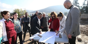 karsiyakanin-yeni-hayvan-barinagi-icin-ilk-kazma-vuruldu.jpg