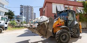 yenisehir-belediyesi-cop-ev-niteligindeki-meskenden-10-kamyon-cop-cikardi.jpg